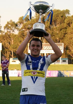 Bulldogs SG Ball Skipper holds the SG Ball aloft for the world to see, Liam was ourfootyteam's man of the match (Photo's : ourfooty media)