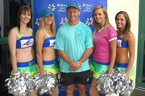 Neil Henry with some of the Raiderette's 