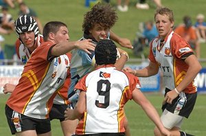 EJ Fernando in the thick of the action for Western Academy against Far West Academy at Apex Oval on Saturday