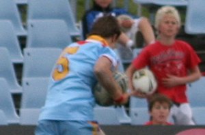 Speedster Andrew Montgomery heads for the try line from 40 meters out ( Photo : Steve Montgomery / OurFootyTeam.com) 