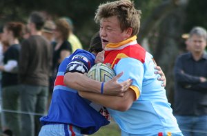 Big Zac Weddersweiller charges the ball up 