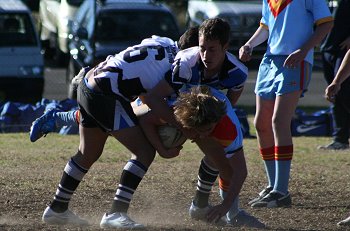 Rea Pittman & Stacey Morelli dump De La full back Andrew Monty on his head ( Photo : ourfooty media) 