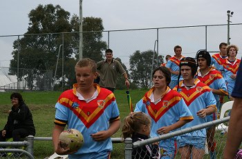 Luke Mannahan leads De La Salle onto Blaxland Oval