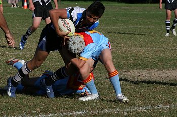 Rea gets ready to put the footy over the try line