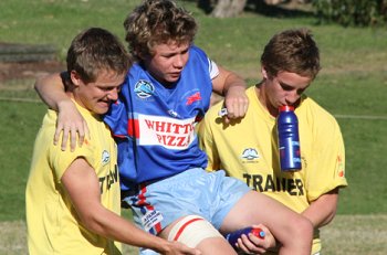 Young Dragons player is carried off, hope he is OK