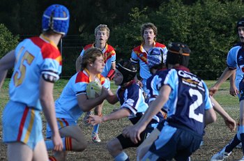 Andrew Montgomery De La winger runs the ball thru the Aquinas line (Photo : ourfooty media) 