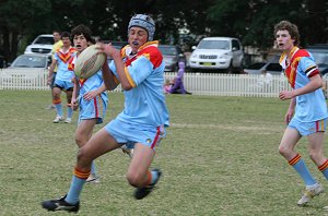 Dion Beattie gets the footy under control 