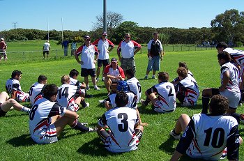 Coach Adam Booth talks to his troop during the break (Photo : ourfooty media)