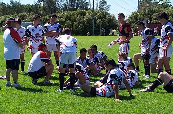 South West Sydney Academy of Sport Coach Adam Booth talks to his troops during the break. ( Photo : ourfooty media)