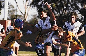 Tylon Tanuvasa (black and white) scored South West Sydney Academy of Sport's first try against Parramatta in his team's 20-10 victory.