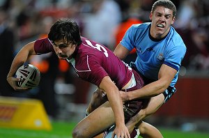 NSW's Jacob Gagan tackles Lachlan Maranta (Photo : QRL)