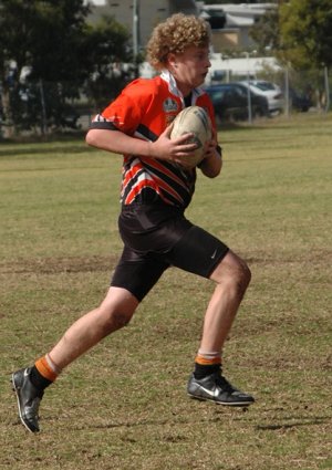 Batemans Bay Tigers under 15s player Andrew Wallace goes for a gallop during the 2008 season.