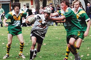 Chaydin Reid swats away CYMS defenders during Cowra’s minor-premiership winning 24-0 success over Orange CYMS on Saturday.