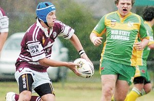 Blayney’s Alex Pettit takes on the Orange CYMS defensive line earlier this season