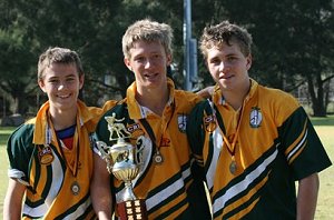 Ethan Ernst, Damien Menzies and Ethan Andrews celebrate after the Under 15 Group 21side won the Country Championship plate final.