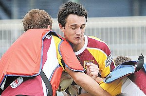 Singleton’s Dale Watson takes the ball into this opposed drill at last Sunday’s GNA training session.