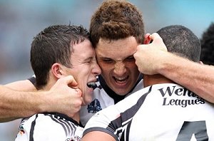 Tim Mortimer (left) celebrates winning the NSW Cup with his Wentworthville team-mates yesterday.