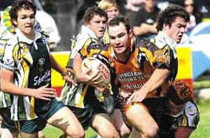 Joey Latham barges through the opposition in the Wingham Tigers’ 