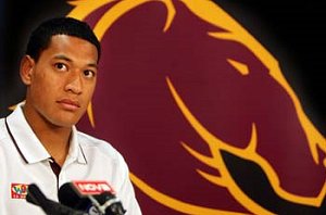 Israel Folau is the latest to wear the Broncos' famous badge. Picture: Annette Dew. / The Courier-Mail