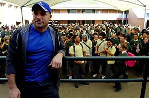 Hazem El Masri was genuinely stunned by the reception the students gave him at Hoxton Park High School yesterday. Photo: Elliott Housego