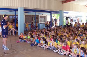 Development Manager Dean Payne addresses a school assembly in Cloncurry