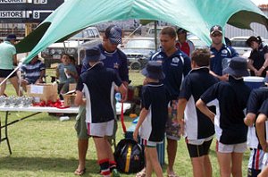 Cowboys Nathan Barraclough and Ray Thompson congratulate the runners-up in the Jacob Lillyman Shield.