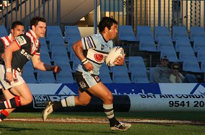 Joel Romelo running up the middle of Shark Park against the Roosters (Photo : ourfooty media)