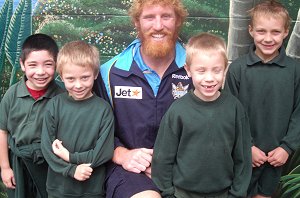 Brad Meyers with students from Eagleby State School.