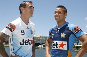 Mat Rogers and Scott Prince (right) model the new home and away strips. PHOTO: Alana Sykes.