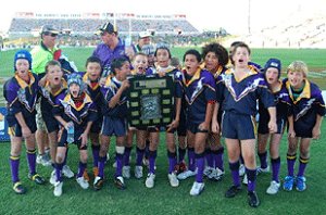 Far North great Laurie Spina with the Edmonton boys who won the Shield bearing his name. 