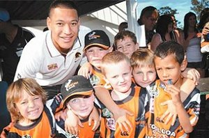 Israel Folau with Wallabys U7s at the official opening of Marley Brown Oval. Chrissy Harris