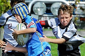 Souths' Tom Wilson tries to break the tackle of Magpies' Joel Haynes on the opening day of Mackay junior rugby league fixtures. Amanda Balmer