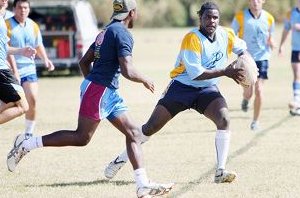 Robert Jawai (with ball) does a passing drill with Nathan Kepa yesterday.