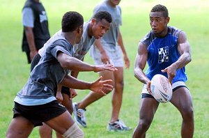 Noa Kurumaira (right) looking for runners during the Fiji Secondary School under-19 rugby league team training at the Fiji College of Advanced Education grounds in Valelevu