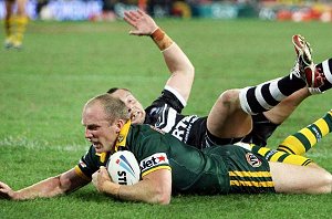 Darren Lockyer scores a try during the Rugby League World Cup Final game between Australia and New Zealand in Brisbane. Lockyer was named the man of the match. / The Sunday Telegraph