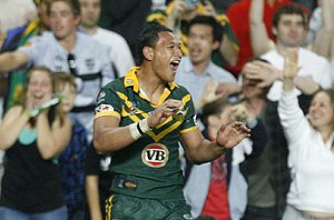 Israel Folau shows his joy after scoring for Australia against New Zealand in the Rugby League World Cup (reuters)