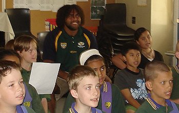 Big Sam Thaiday takes an Art class at Kruger SS