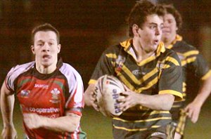 Zacc Dougless runs flat out against the Welsh U18's (Photo : Ian LOVELL ) 