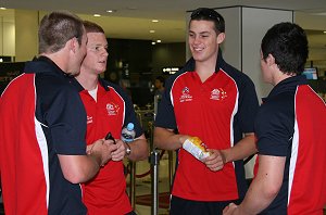 Michael Lucas (sunnies) AIS team at the Sydney Airport (Photo : ourfootymedia)