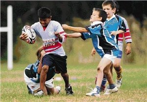 A Brighton-Le-Sands Public school player charges at the Carlton Public School defence in the Botany Bay Division final of the Lance Thompson Cup. Picture: Chris Lane