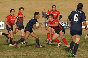 Dubbo College's Max Ryan (right) sets up to tackle his Chifley College opponent