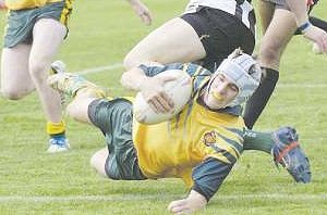 Zac Newcombe crosses for Gunnedah in their University Shield victory against Dubbo College yesterday.