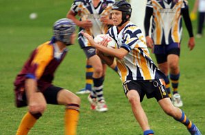 Kooringal High player Lachlan Parker runs at Mater Dei hooker Jack Burey in their Hardy Shield grand final played yesterday at Conolly Rugby Park. Picture: Kerrie Stewart