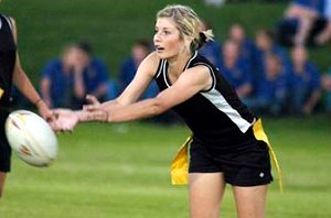 Megan Troldahl passes off to a teammate in the Dave Sheldrick Cup game against YAHS last Tuesday at No. 1 Oval.