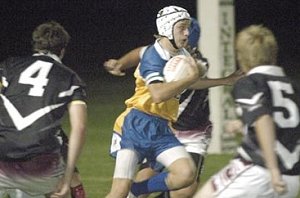 Luke Olsson slices through the Leeton High School defence in his side’s 50-nil triumph in their Dave Sheldrick Shield game last Wednesday