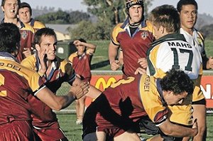 Ryan Billingham cops the brunt of strong Mater Dei Catholic College defence in last night’s Hardy Shield match at Equex. 