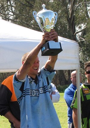 Red Bend Opens Captain Jake Grace hold the CRL CUP aloft in celebration of the 2009 victory