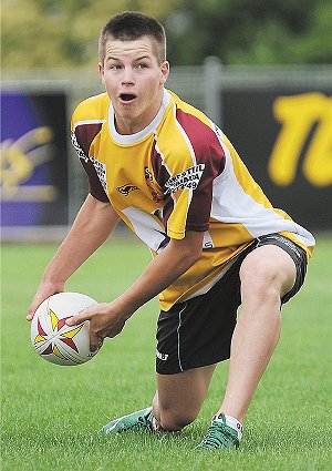 Corey Holman delivers this pass during yesterday’s final GNA training session