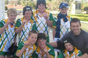 Russell Richardson with, from left, (front) Jaiden Burke, Bradley Watt, Bradley Gaut, Riley Hawkins; (back) Will Nixon, Eddie Turner, Hayden Yates, Nicholas Aveyard.