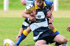 Wagga High centre Mick Mattingly shows great determination to score the team's only try against Warilla High in the Buckley Shield